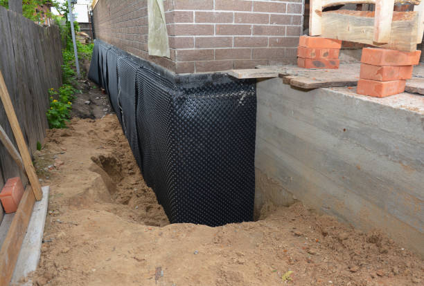 Happy homeowners after waterproofing job in Rome City